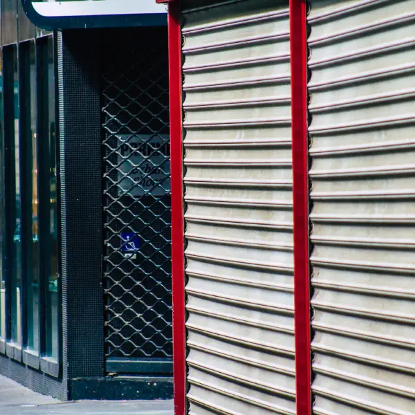 Row of commercial shutters in Exmouth town centre